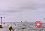 Image of USS Cod (SS-224) fires at Dutch submarine, O-19, to scuttle her Spratly Islands, 1945, second 19 stock footage video 65675076089