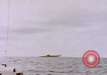 Image of USS Cod (SS-224) fires at Dutch submarine, O-19, to scuttle her Spratly Islands, 1945, second 22 stock footage video 65675076089