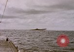 Image of USS Cod (SS-224) fires at Dutch submarine, O-19, to scuttle her Spratly Islands, 1945, second 29 stock footage video 65675076089