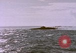 Image of USS Cod (SS-224) fires at Dutch submarine, O-19, to scuttle her Spratly Islands, 1945, second 39 stock footage video 65675076089