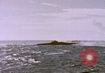 Image of USS Cod (SS-224) fires at Dutch submarine, O-19, to scuttle her Spratly Islands, 1945, second 41 stock footage video 65675076089