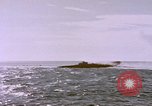 Image of USS Cod (SS-224) fires at Dutch submarine, O-19, to scuttle her Spratly Islands, 1945, second 43 stock footage video 65675076089