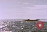 Image of USS Cod (SS-224) fires at Dutch submarine, O-19, to scuttle her Spratly Islands, 1945, second 47 stock footage video 65675076089