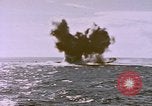 Image of USS Cod (SS-224) fires at Dutch submarine, O-19, to scuttle her Spratly Islands, 1945, second 51 stock footage video 65675076089