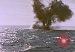 Image of USS Cod (SS-224) fires at Dutch submarine, O-19, to scuttle her Spratly Islands, 1945, second 53 stock footage video 65675076089