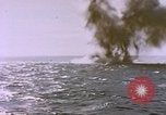 Image of USS Cod (SS-224) fires at Dutch submarine, O-19, to scuttle her Spratly Islands, 1945, second 54 stock footage video 65675076089