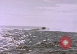 Image of USS Cod (SS-224) fires at Dutch submarine, O-19, to scuttle her Spratly Islands, 1945, second 57 stock footage video 65675076089