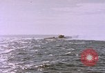Image of USS Cod (SS-224) fires at Dutch submarine, O-19, to scuttle her Spratly Islands, 1945, second 59 stock footage video 65675076089