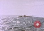 Image of USS Cod (SS-224) fires at Dutch submarine, O-19, to scuttle her Spratly Islands, 1945, second 62 stock footage video 65675076089