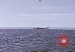 Image of USS Cod fires deck gun in actions to scuttle Dutch submarine, O-19 Spratly Islands, 1945, second 6 stock footage video 65675076091