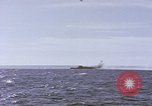 Image of USS Cod fires deck gun in actions to scuttle Dutch submarine, O-19 Spratly Islands, 1945, second 12 stock footage video 65675076091