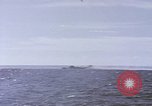 Image of USS Cod fires deck gun in actions to scuttle Dutch submarine, O-19 Spratly Islands, 1945, second 14 stock footage video 65675076091