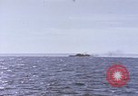 Image of USS Cod fires deck gun in actions to scuttle Dutch submarine, O-19 Spratly Islands, 1945, second 20 stock footage video 65675076091
