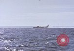 Image of USS Cod fires deck gun in actions to scuttle Dutch submarine, O-19 Spratly Islands, 1945, second 39 stock footage video 65675076091