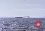 Image of USS Cod fires deck gun in actions to scuttle Dutch submarine, O-19 Spratly Islands, 1945, second 51 stock footage video 65675076091