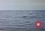 Image of explosion of mine Pacific Ocean, 1945, second 60 stock footage video 65675076099