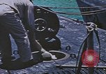 Image of USS Sea Owl arriving in port with Japanese prisoners of war Hawaii USA, 1945, second 43 stock footage video 65675076110