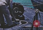 Image of USS Sea Owl arriving in port with Japanese prisoners of war Hawaii USA, 1945, second 44 stock footage video 65675076110