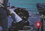 Image of USS Sea Owl arriving in port with Japanese prisoners of war Hawaii USA, 1945, second 50 stock footage video 65675076110