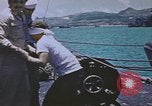 Image of USS Sea Owl arriving in port with Japanese prisoners of war Hawaii USA, 1945, second 52 stock footage video 65675076110