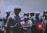Image of USS Sea Owl arriving in port with Japanese prisoners of war Hawaii USA, 1945, second 57 stock footage video 65675076110