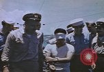 Image of USS Sea Owl arriving in port with Japanese prisoners of war Hawaii USA, 1945, second 58 stock footage video 65675076110