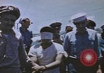 Image of USS Sea Owl arriving in port with Japanese prisoners of war Hawaii USA, 1945, second 59 stock footage video 65675076110