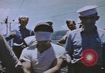 Image of USS Sea Owl arriving in port with Japanese prisoners of war Hawaii USA, 1945, second 60 stock footage video 65675076110