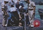 Image of USS Sea Owl arriving in port with Japanese prisoners of war Hawaii USA, 1945, second 62 stock footage video 65675076110
