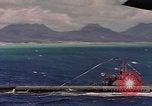 Image of VJ Day  being celebrated by US submarines at Pearl Harbor Hawaii USA, 1945, second 43 stock footage video 65675076117