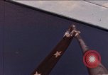Image of US Sailors decorate their submarine on VJ Day in Pearl Harbor Hawaii USA, 1945, second 1 stock footage video 65675076118