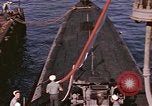 Image of US Sailors decorate their submarine on VJ Day in Pearl Harbor Hawaii USA, 1945, second 11 stock footage video 65675076118
