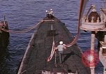 Image of US Sailors decorate their submarine on VJ Day in Pearl Harbor Hawaii USA, 1945, second 16 stock footage video 65675076118