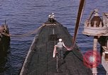 Image of US Sailors decorate their submarine on VJ Day in Pearl Harbor Hawaii USA, 1945, second 18 stock footage video 65675076118