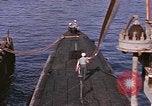 Image of US Sailors decorate their submarine on VJ Day in Pearl Harbor Hawaii USA, 1945, second 19 stock footage video 65675076118