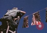 Image of US Sailors decorate their submarine on VJ Day in Pearl Harbor Hawaii USA, 1945, second 27 stock footage video 65675076118