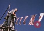 Image of US Sailors decorate their submarine on VJ Day in Pearl Harbor Hawaii USA, 1945, second 30 stock footage video 65675076118