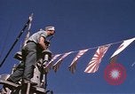 Image of US Sailors decorate their submarine on VJ Day in Pearl Harbor Hawaii USA, 1945, second 31 stock footage video 65675076118