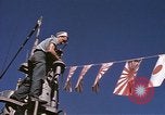 Image of US Sailors decorate their submarine on VJ Day in Pearl Harbor Hawaii USA, 1945, second 36 stock footage video 65675076118