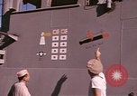 Image of US Sailors decorate their submarine on VJ Day in Pearl Harbor Hawaii USA, 1945, second 41 stock footage video 65675076118