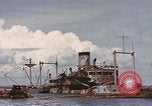 Image of Hulks of Japanese ships bombed by US in Coron Bay Philippines, 1945, second 16 stock footage video 65675076120