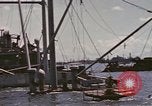 Image of Hulks of Japanese ships bombed by US in Coron Bay Philippines, 1945, second 53 stock footage video 65675076120