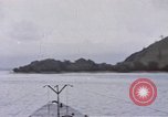 Image of American submarine waits in bay for commandos Pacific Theater, 1944, second 3 stock footage video 65675076122