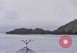 Image of American submarine waits in bay for commandos Pacific Theater, 1944, second 6 stock footage video 65675076122