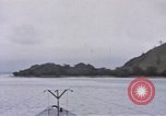 Image of American submarine waits in bay for commandos Pacific Theater, 1944, second 7 stock footage video 65675076122