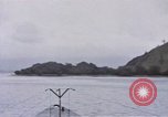 Image of American submarine waits in bay for commandos Pacific Theater, 1944, second 8 stock footage video 65675076122