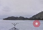 Image of American submarine waits in bay for commandos Pacific Theater, 1944, second 9 stock footage video 65675076122