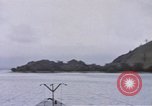 Image of American submarine waits in bay for commandos Pacific Theater, 1944, second 11 stock footage video 65675076122
