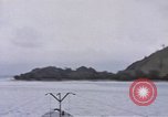 Image of American submarine waits in bay for commandos Pacific Theater, 1944, second 12 stock footage video 65675076122