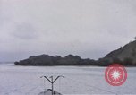 Image of American submarine waits in bay for commandos Pacific Theater, 1944, second 14 stock footage video 65675076122